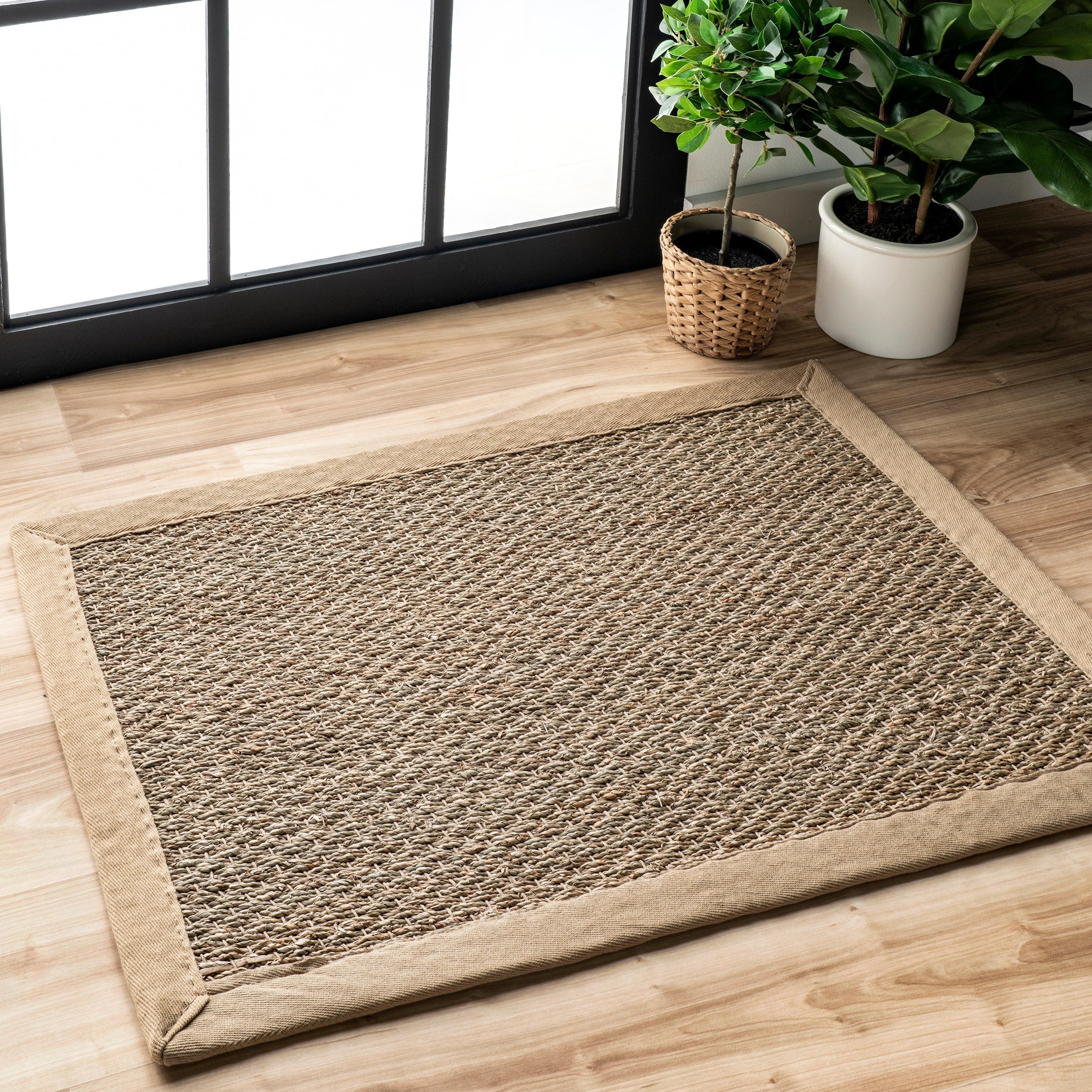 Tapis Nuloom Kiana Casual à bordure en jonc de mer
