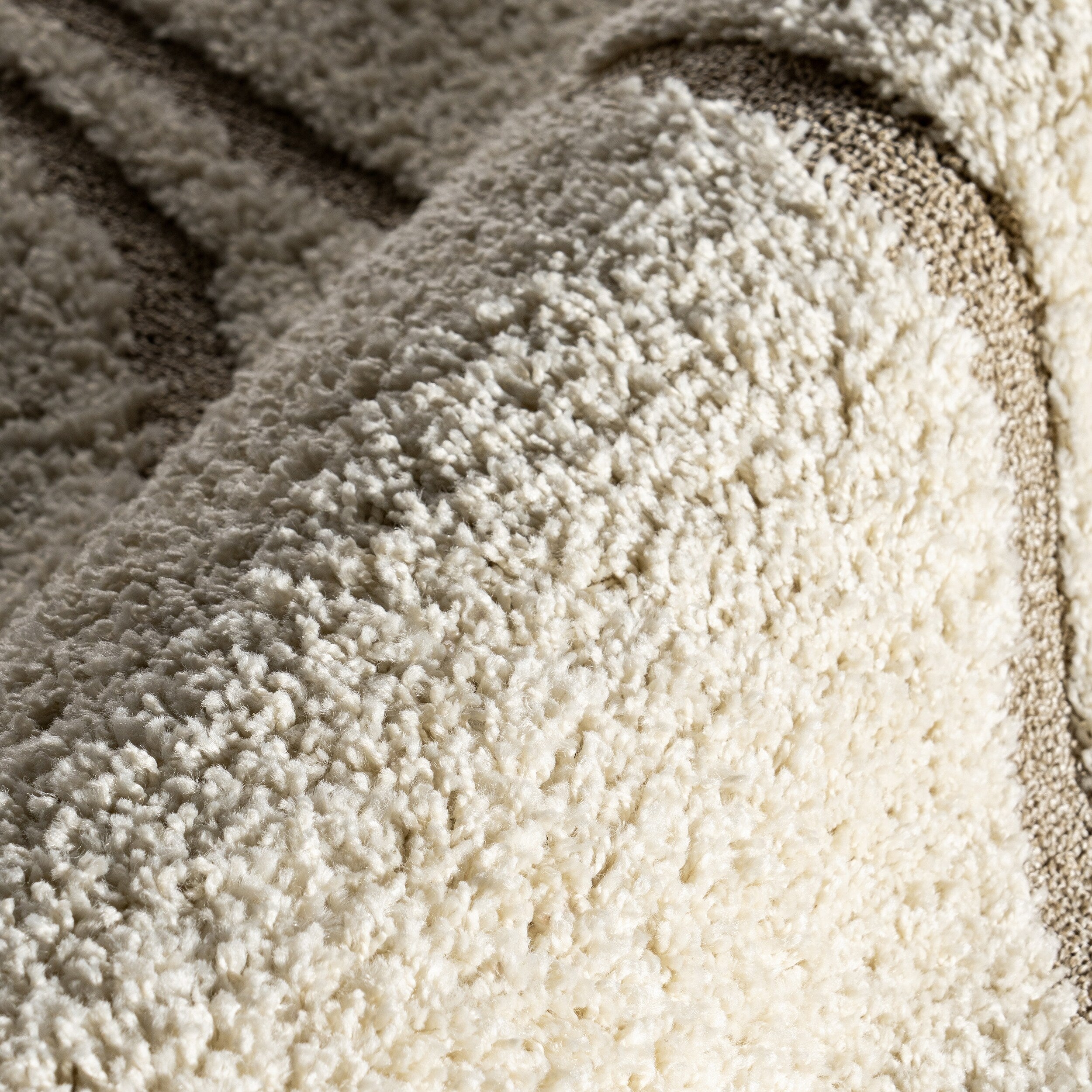 Tapis à poils longs Nuloom Krista contemporain à motifs tourbillonnants