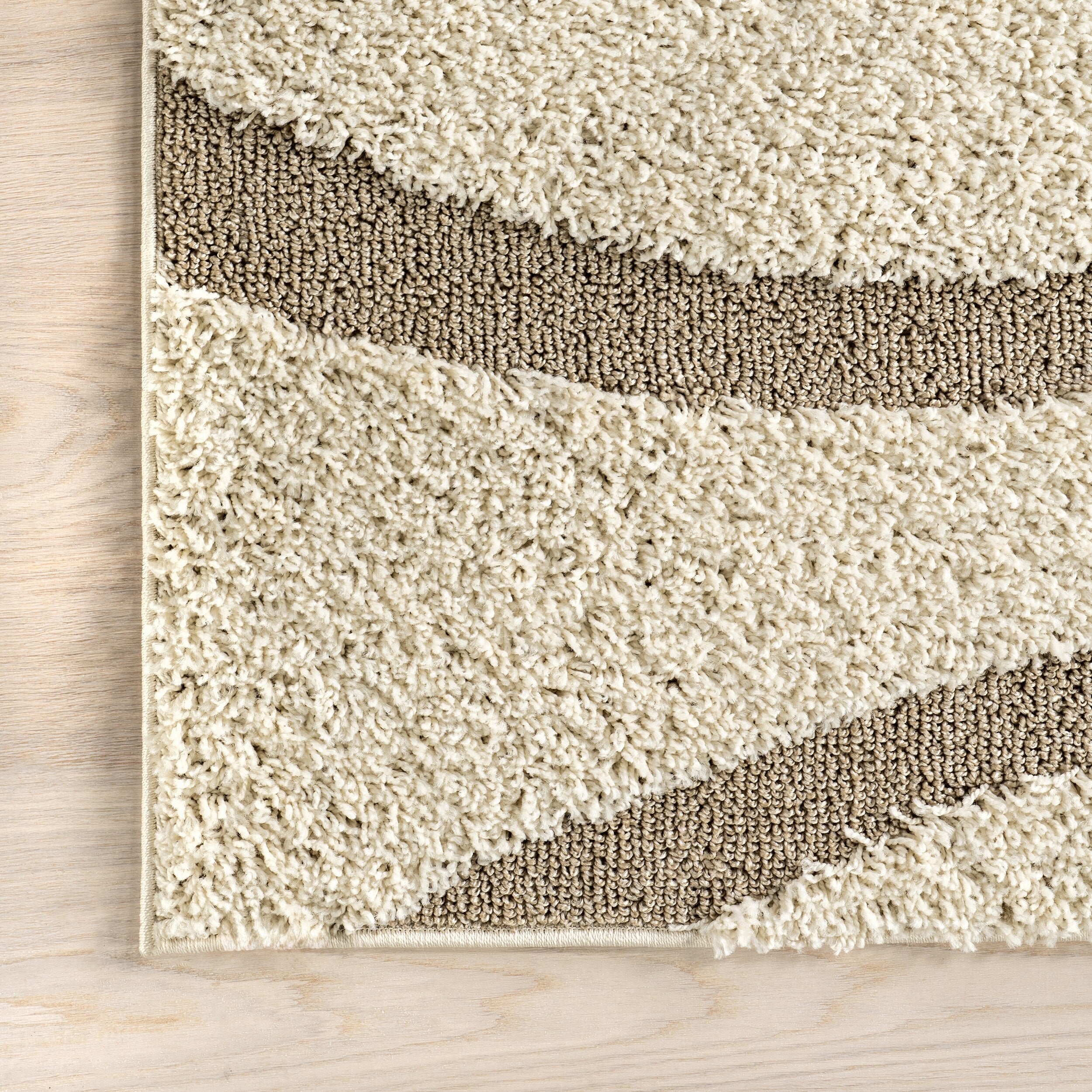 Tapis à poils longs Nuloom Krista contemporain à motifs tourbillonnants