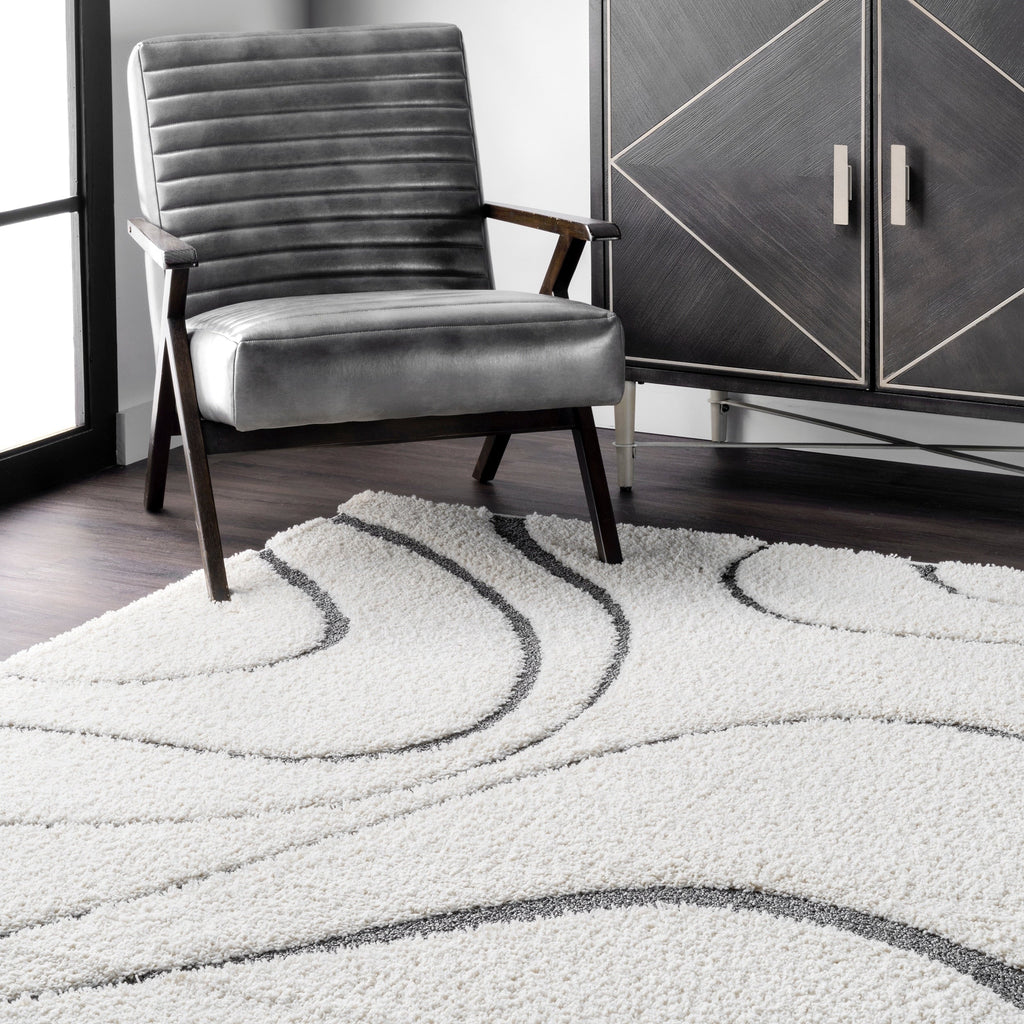 Tapis à poils longs Nuloom Krista contemporain à motifs tourbillonnants