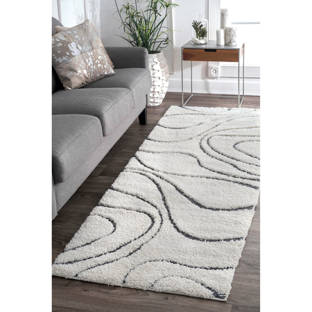 Tapis à poils longs Nuloom Krista contemporain à motifs tourbillonnants