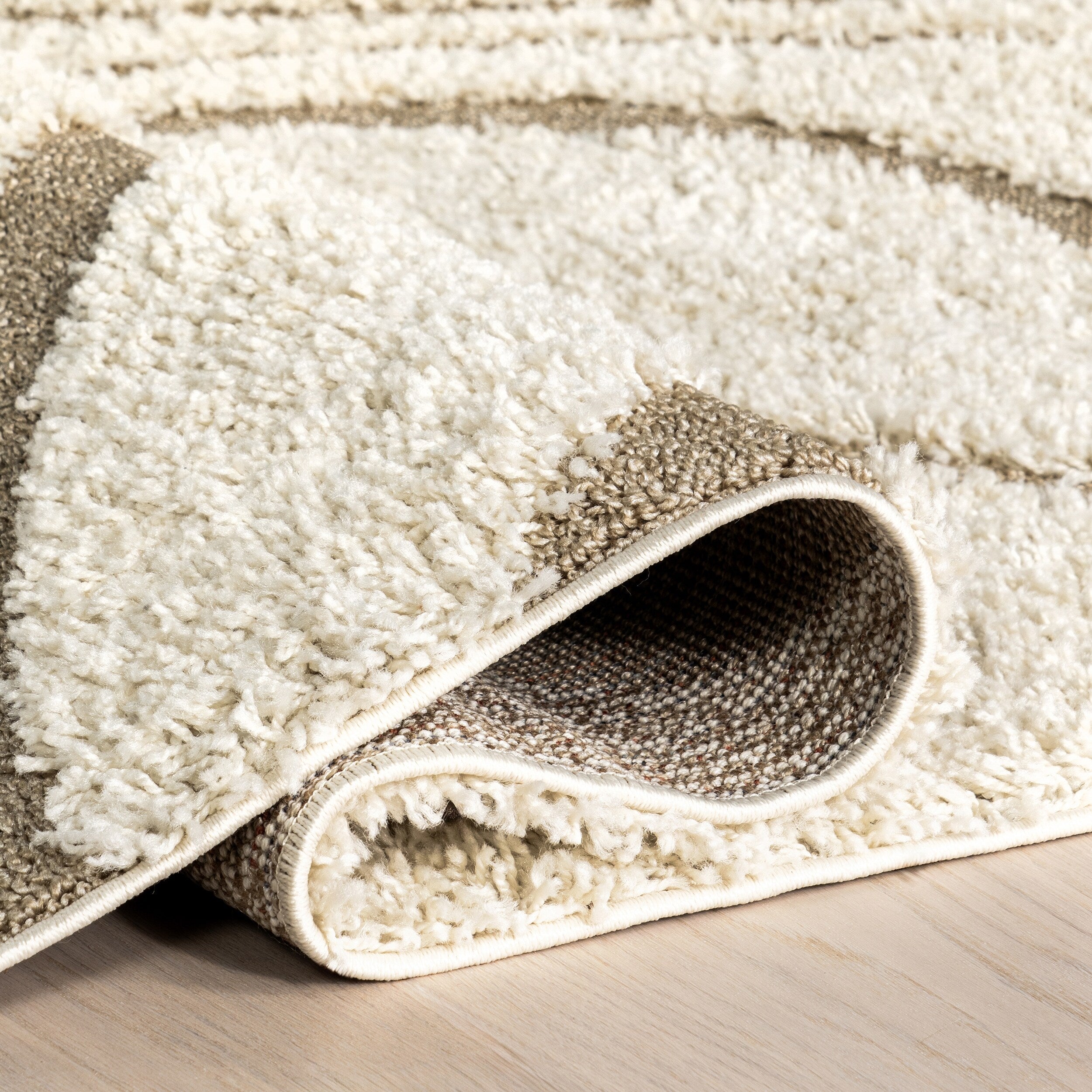 Tapis à poils longs Nuloom Krista contemporain à motifs tourbillonnants