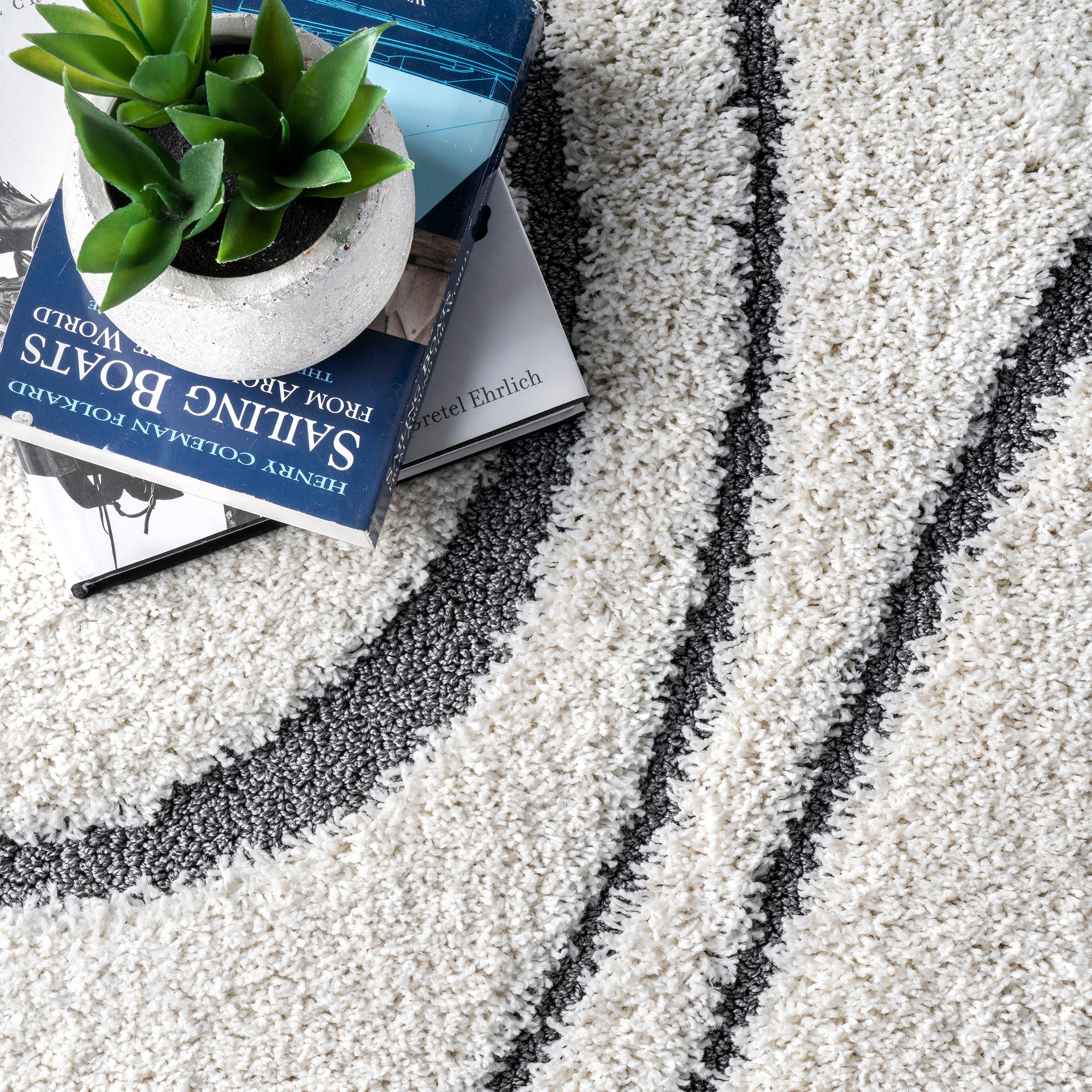 Tapis à poils longs Nuloom Krista contemporain à motifs tourbillonnants