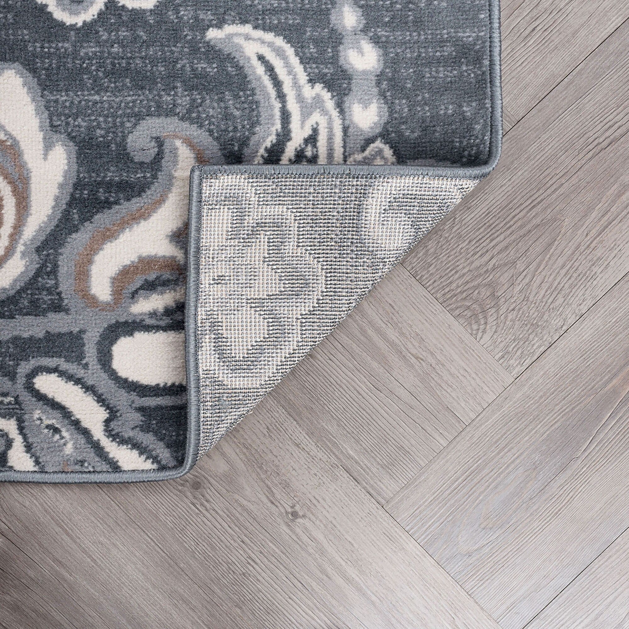 Tapis d'intérieur Carrington à motifs floraux et botaniques de transition