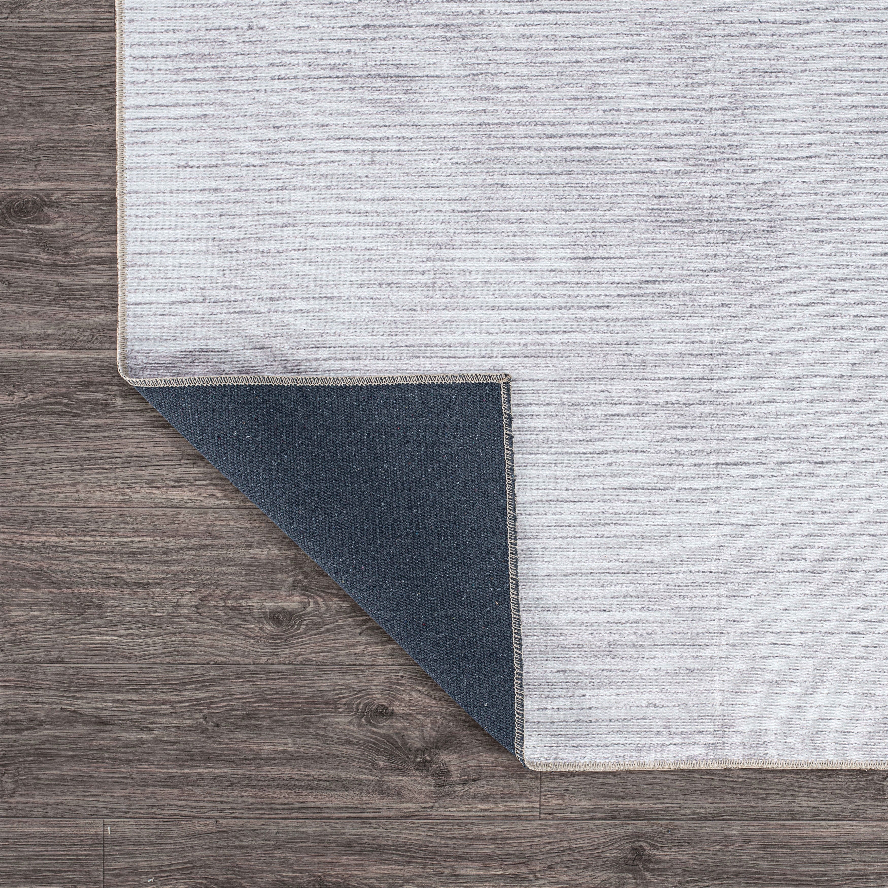 Tapis contemporain à rayures usées lavable en machine