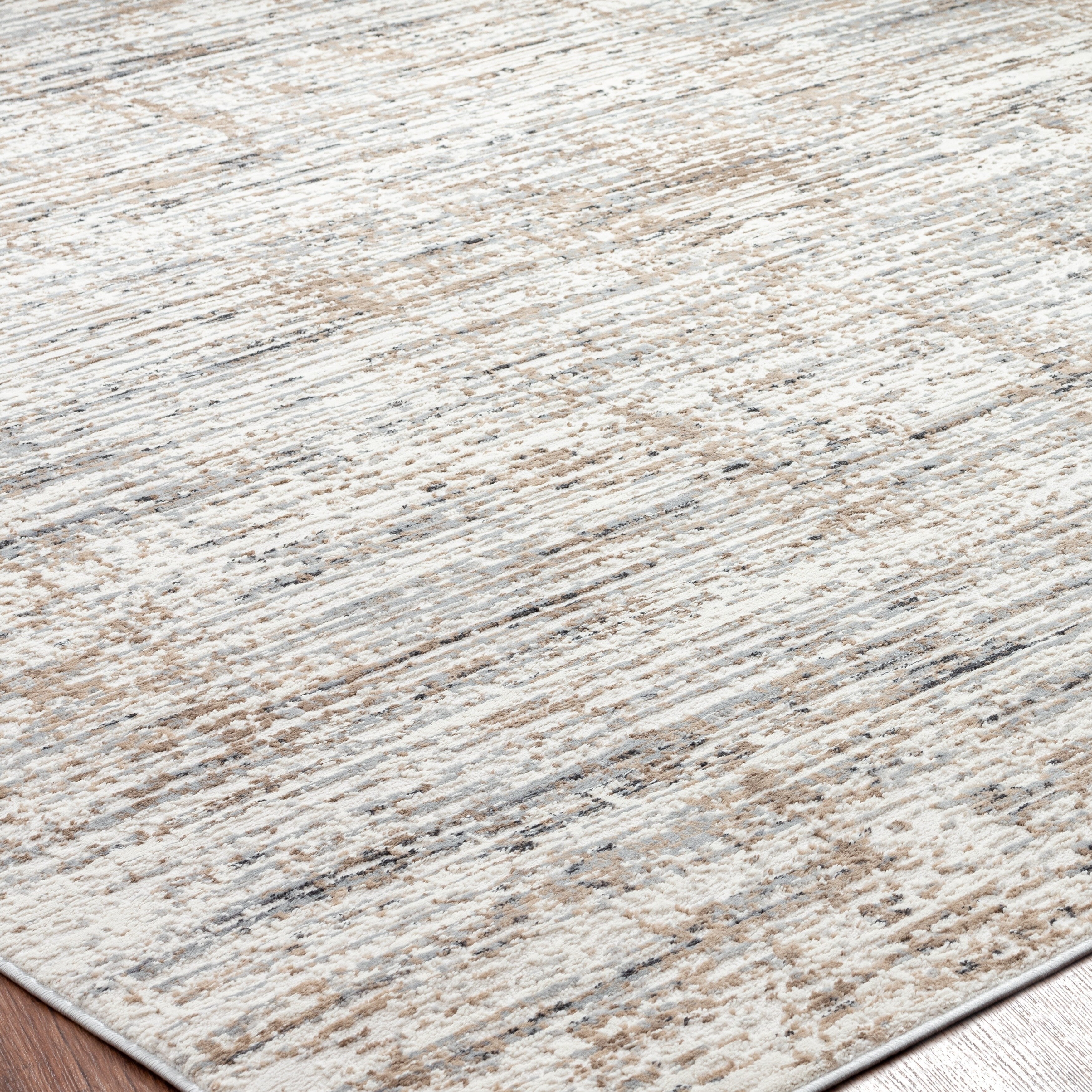 Tapis Lumina à poils longs et courts, style moderne et contemporain, motif abstrait.