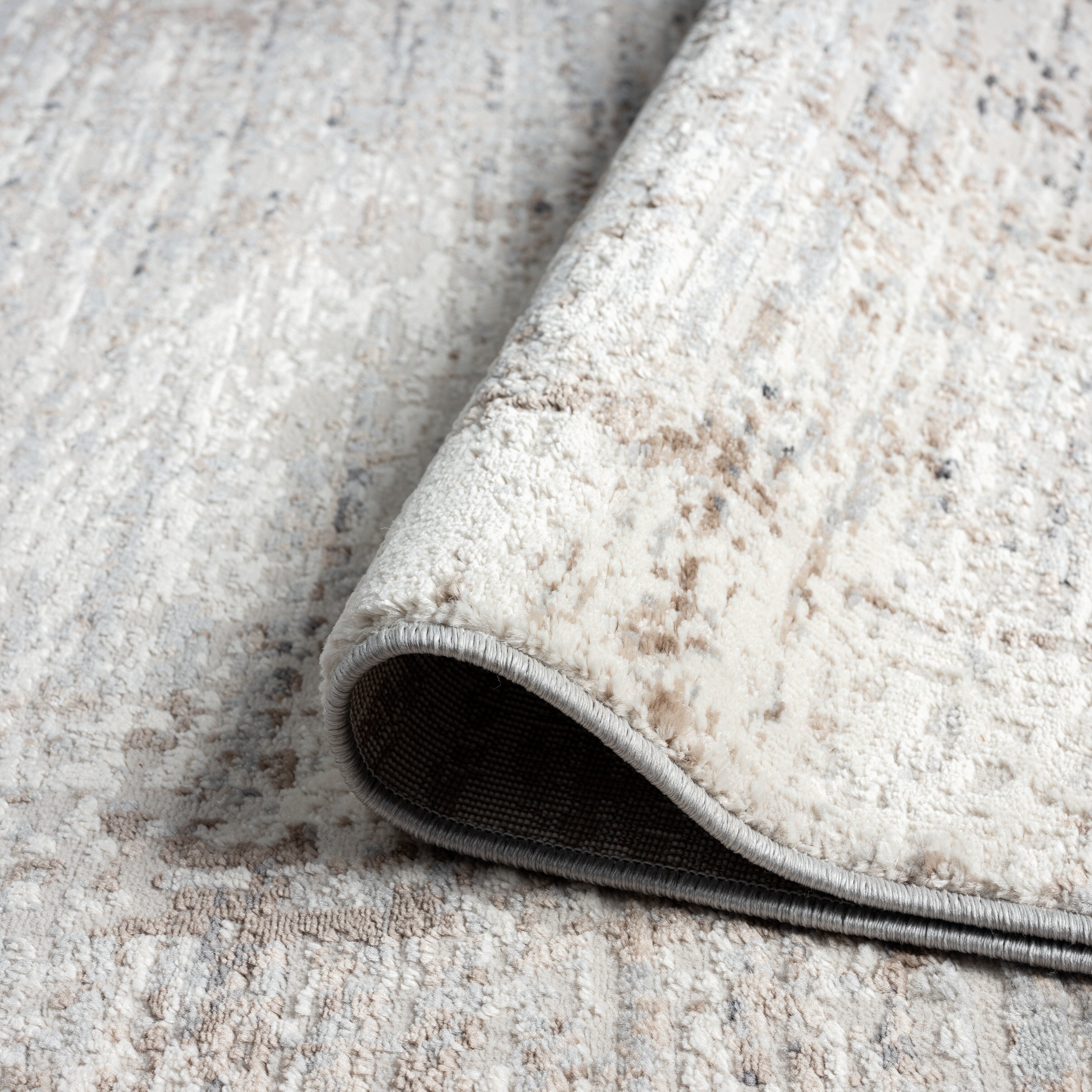 Tapis Lumina à poils longs et courts, style moderne et contemporain, motif abstrait.