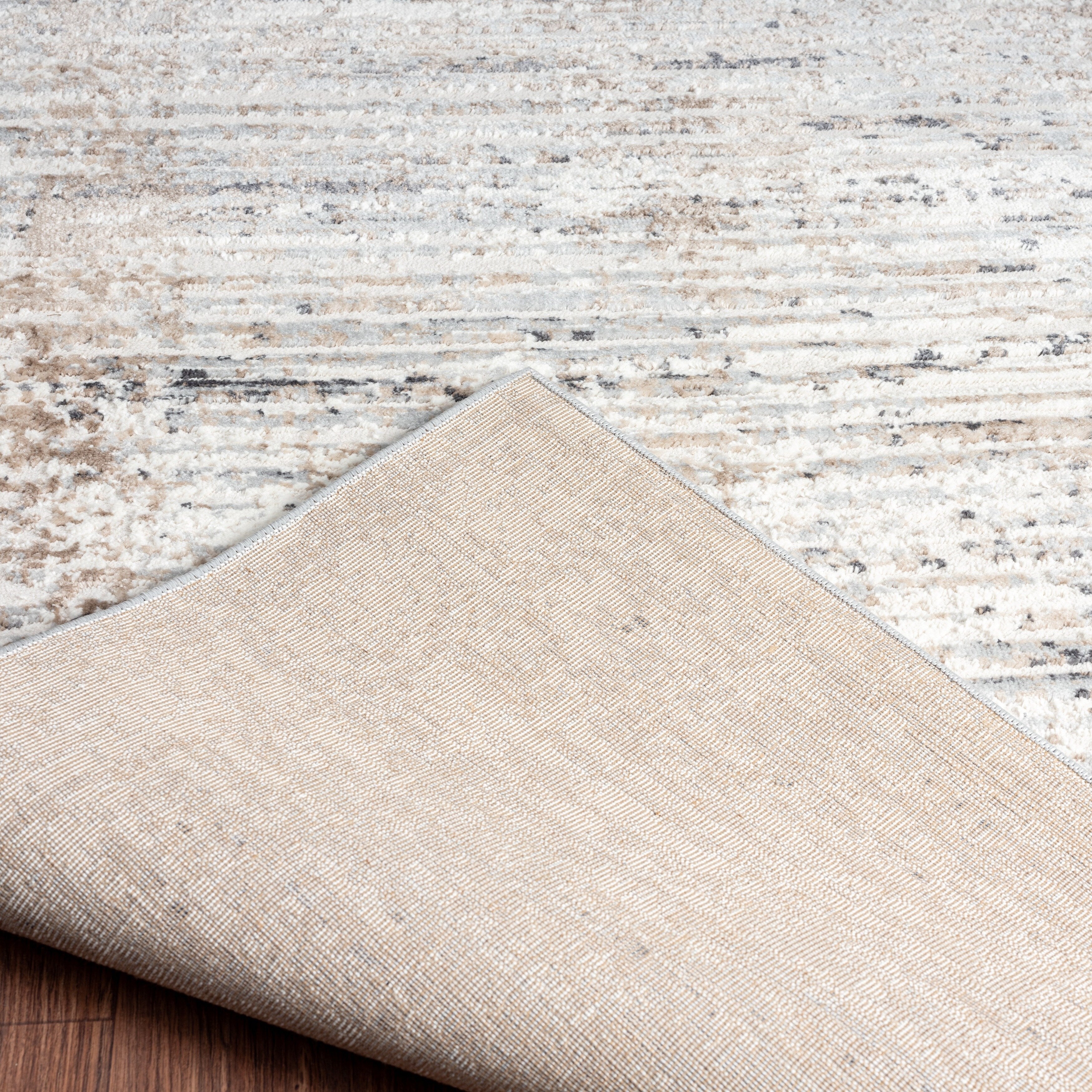 Tapis Lumina à poils longs et courts, style moderne et contemporain, motif abstrait.