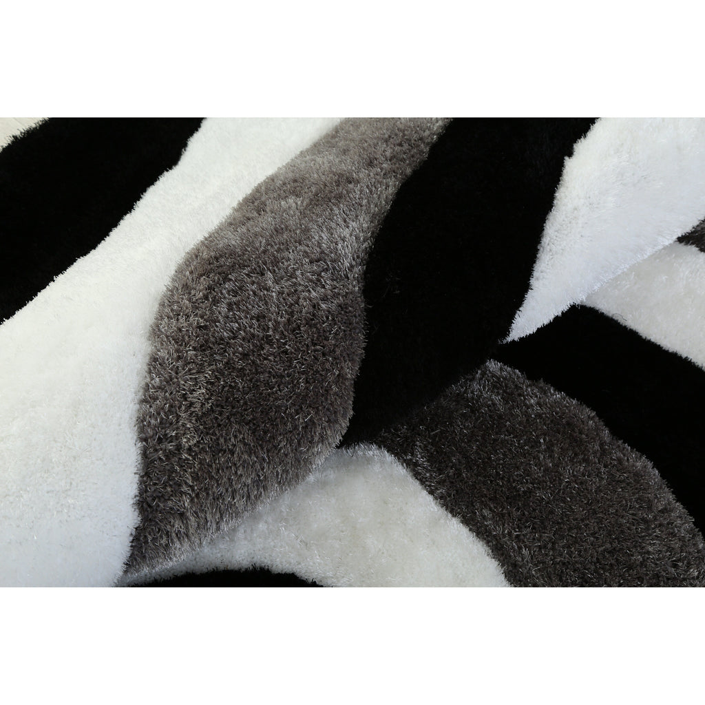 Tapis à poils longs Mateos au design abstrait