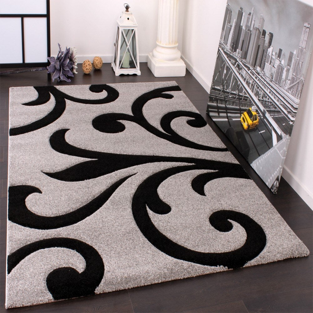 Tapis moderne à motif floral et découpe contour