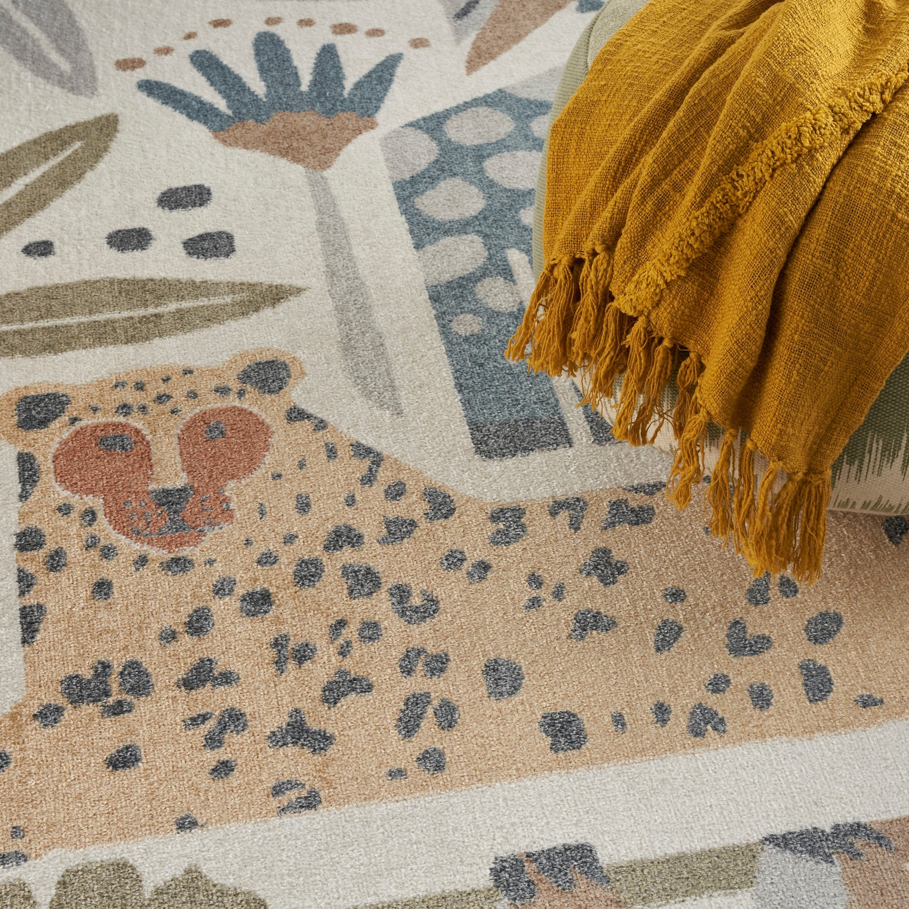 Tapis Nourison Astra lavable en machine à motif animalier