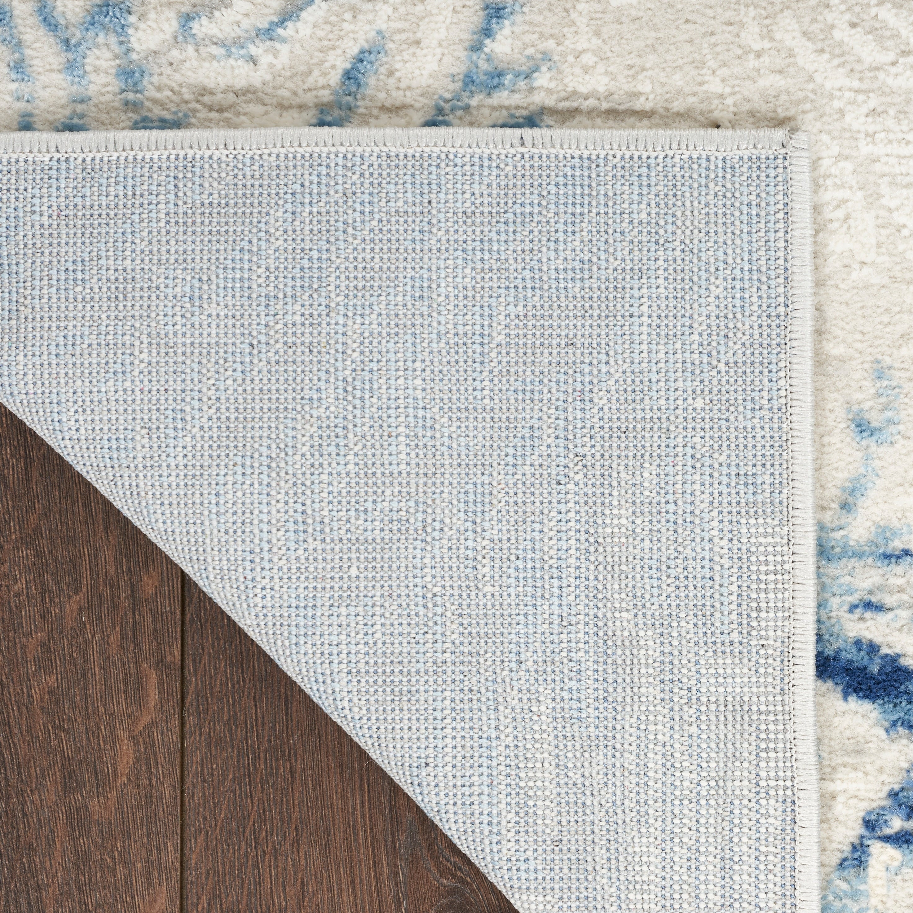 Tapis Nourison Pompéi, motif coquillages et coraux, idéal pour la plage côtière