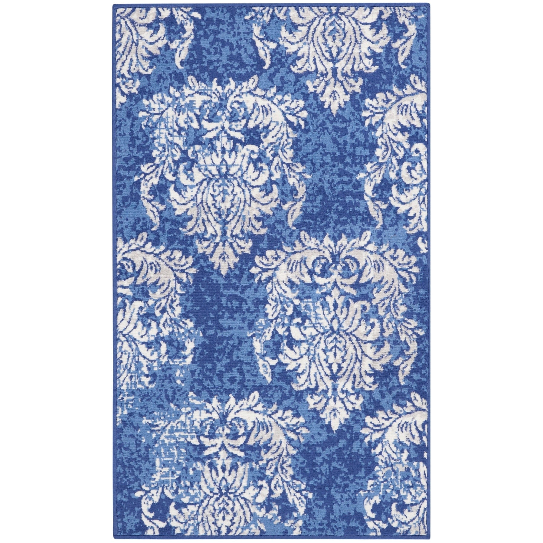 Tapis Nourison Whimsicle style campagne française, motif botanique, ivoire et marine