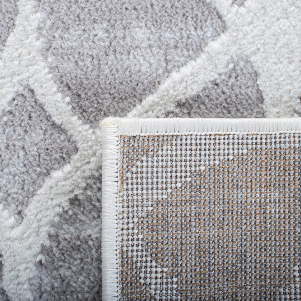 Tapis SAFAVIEH Amelia Tanasa géométrique à l'aspect vieilli