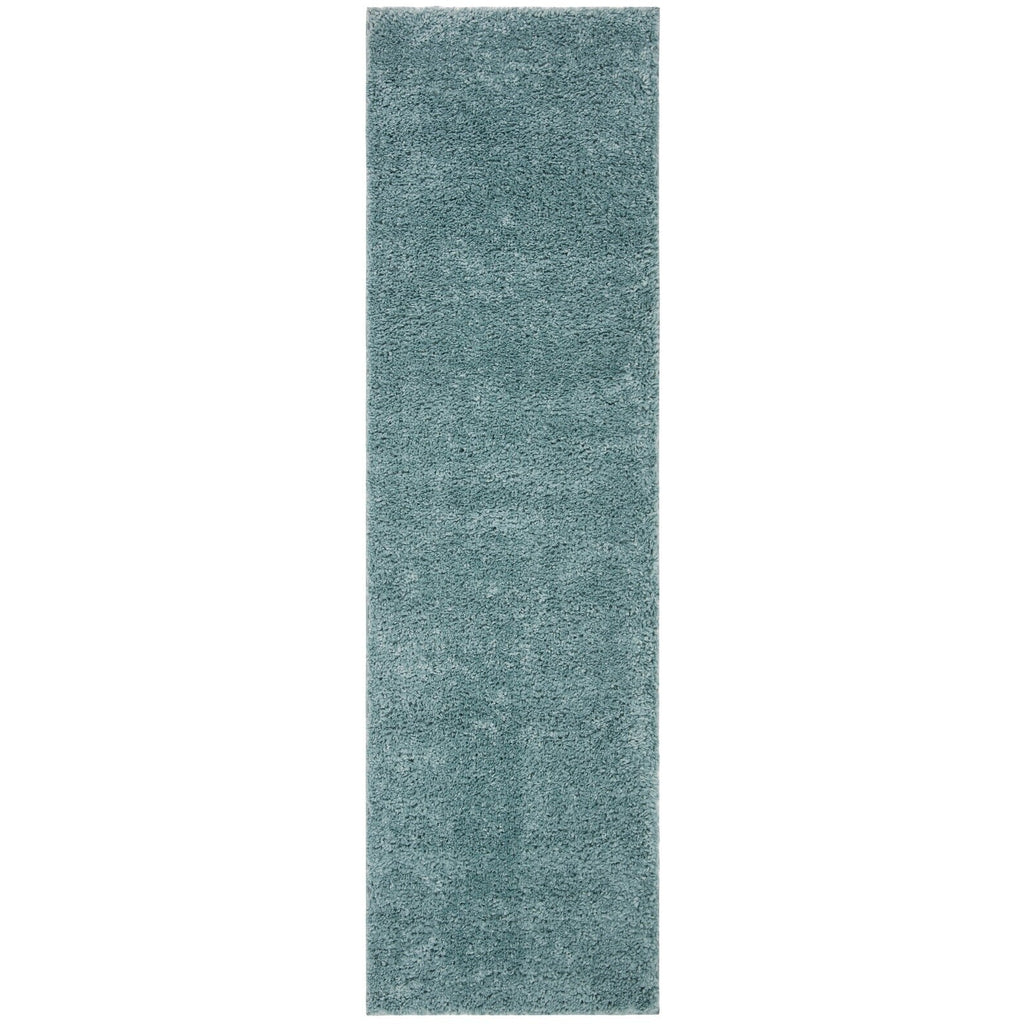 Tapis SAFAVIEH August Wilhelma Shag uni de 3 cm d'épaisseur
