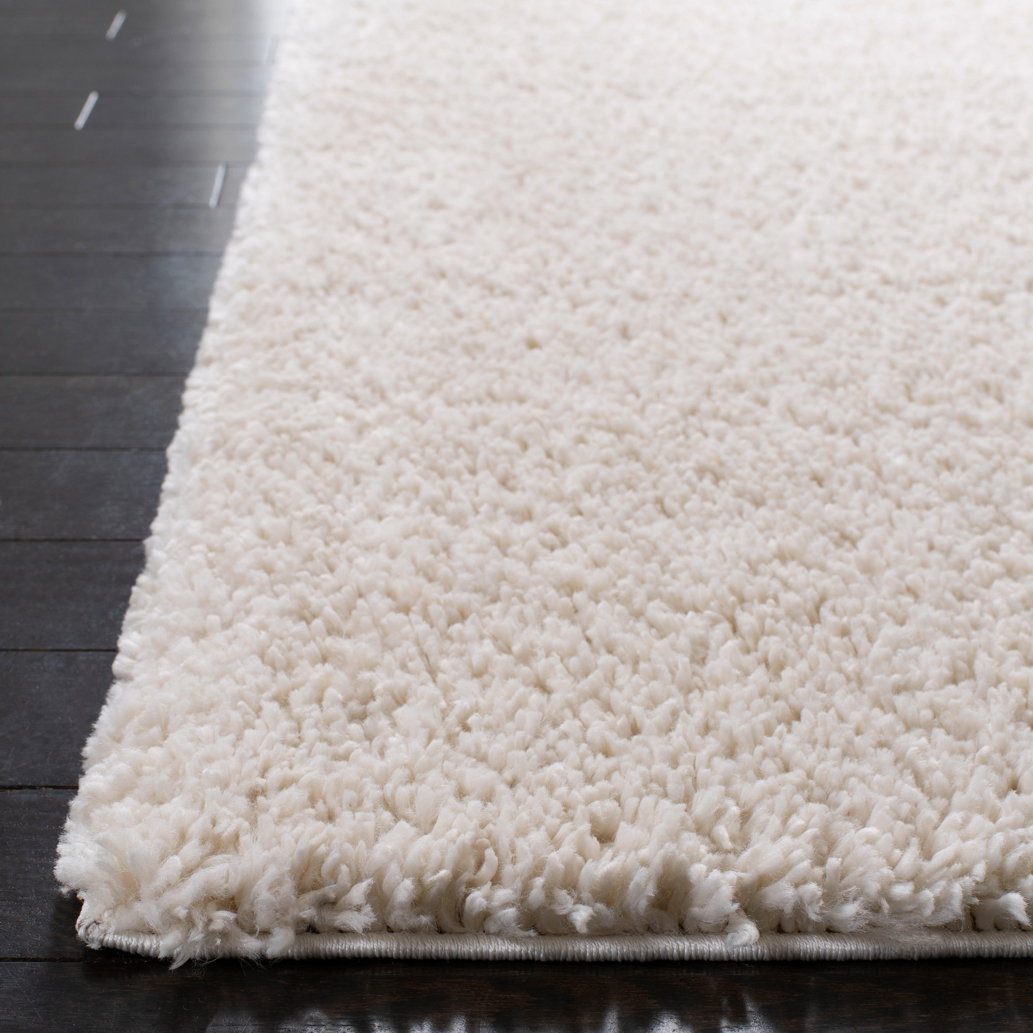Tapis SAFAVIEH August Wilhelma Shag uni de 3 cm d'épaisseur