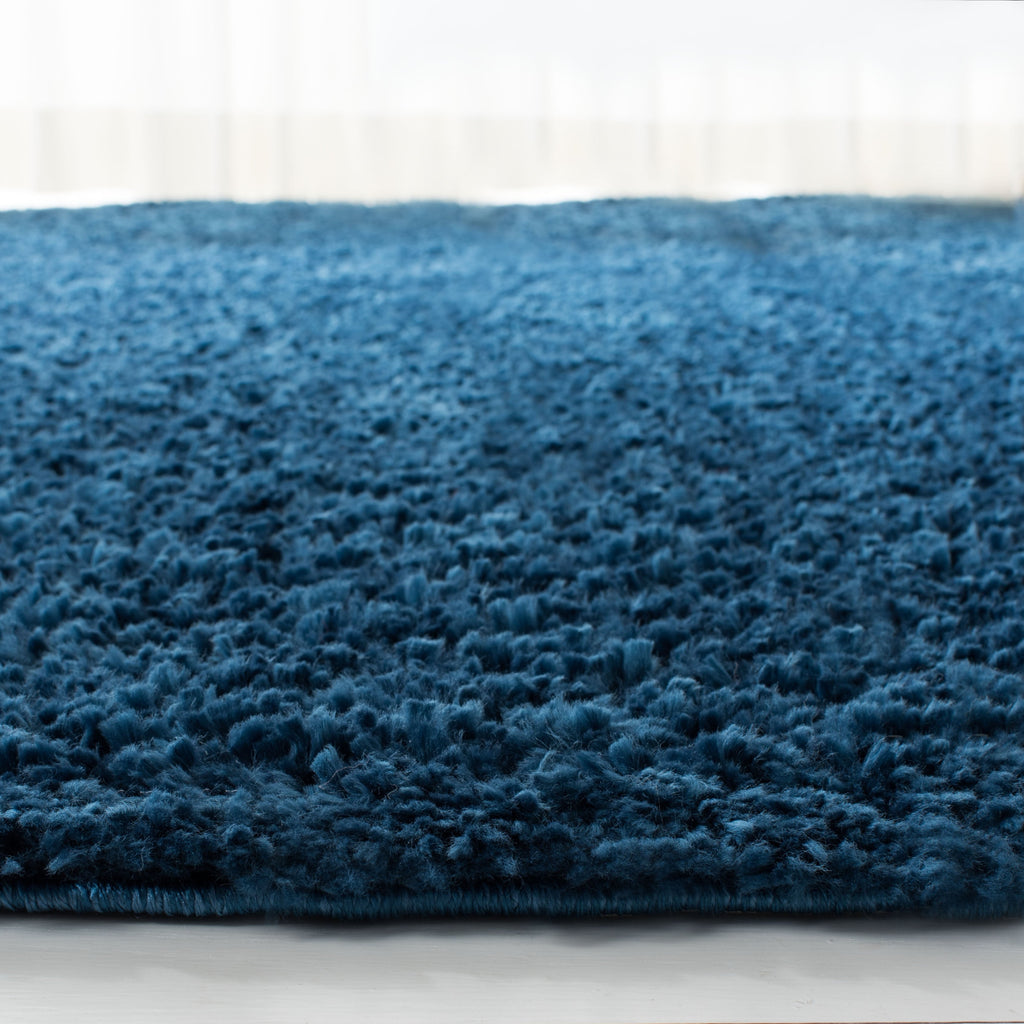 Tapis SAFAVIEH August Wilhelma Shag uni de 3 cm d'épaisseur