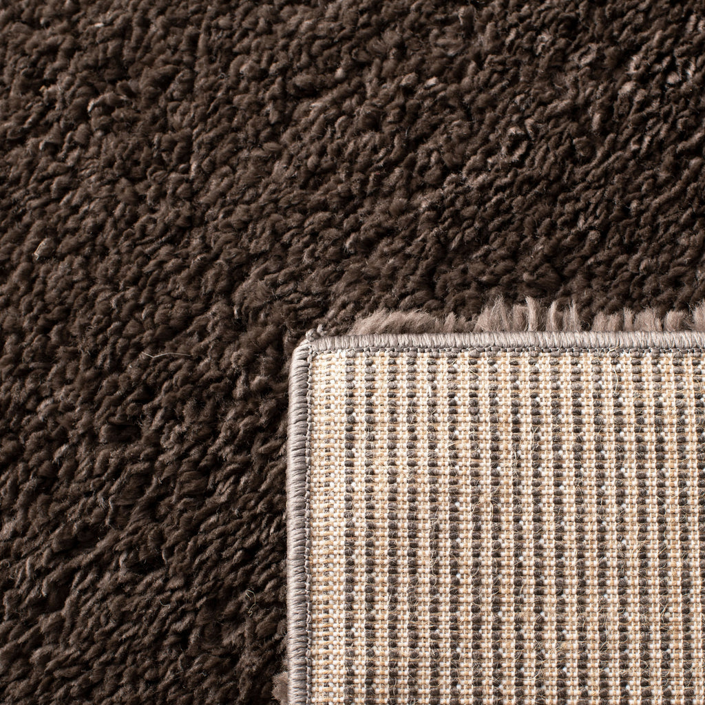 Tapis SAFAVIEH August Wilhelma Shag uni de 3 cm d'épaisseur