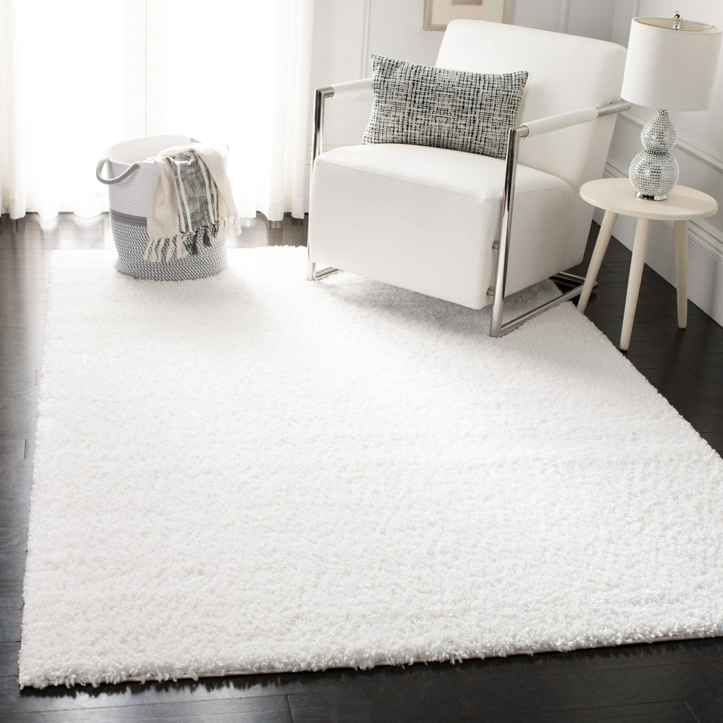 Tapis SAFAVIEH August Wilhelma Shag uni de 3 cm d'épaisseur