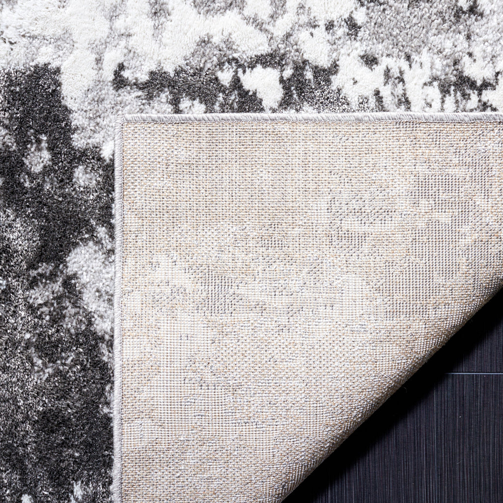 Tapis abstrait moderne SAFAVIEH Century Dagnija