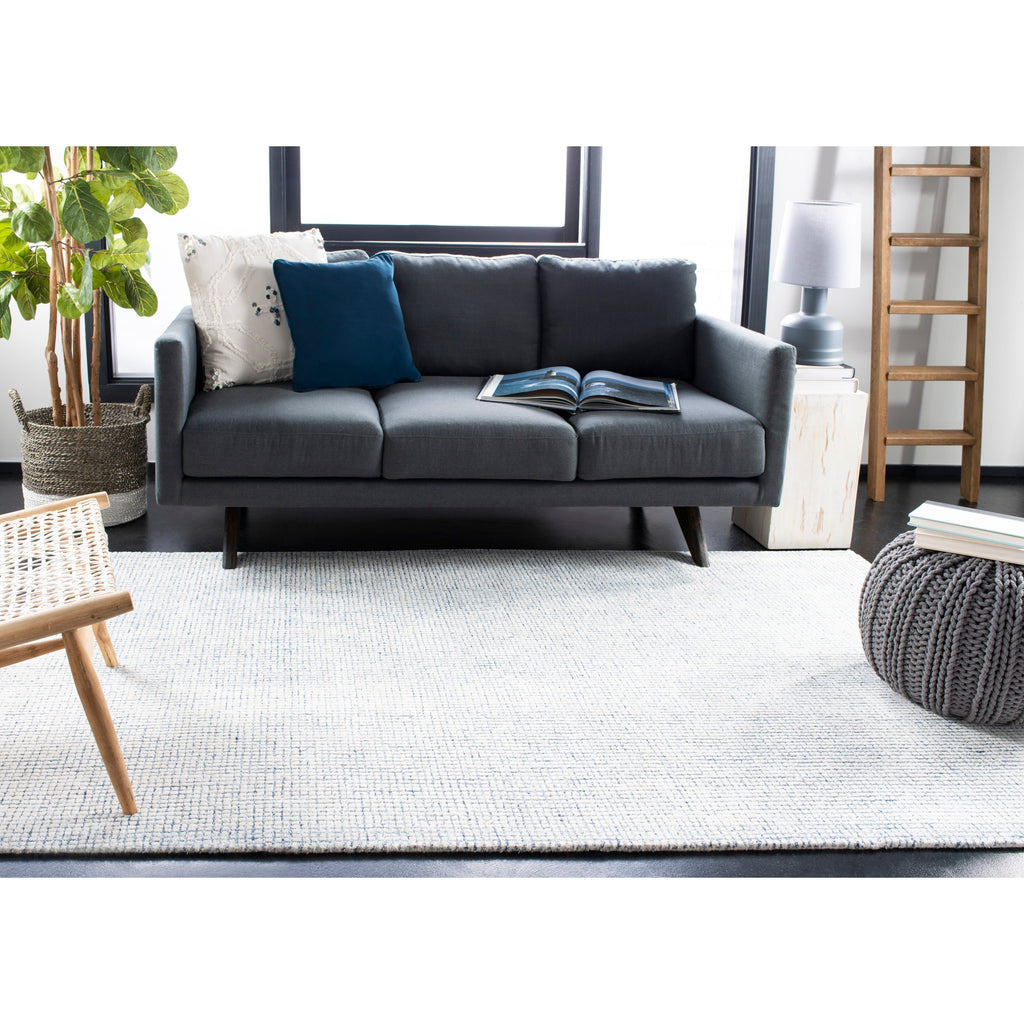 SAFAVIEH Handmade Abstract Marikka Modern Viscose Rug