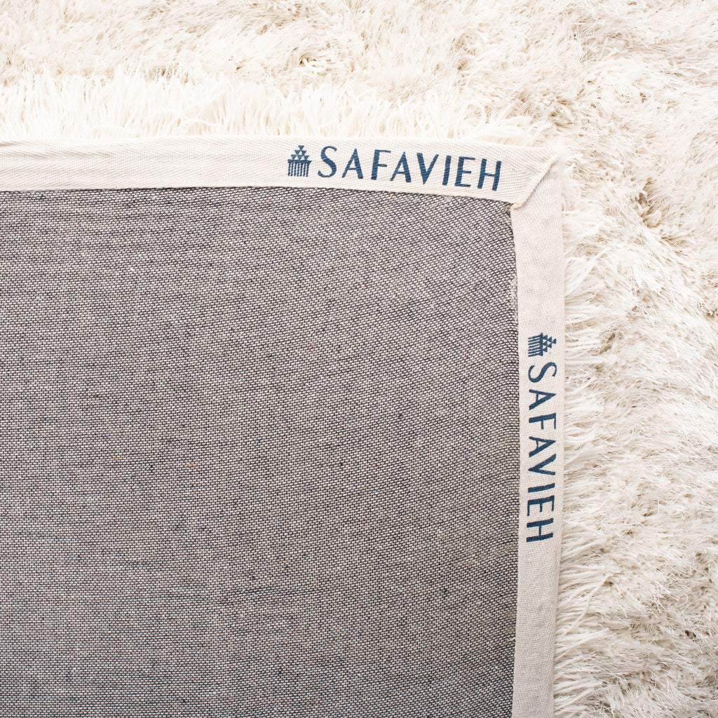 SAFAVIEH Handmade Fiona Shag Djenka 3-inch Thick Rug