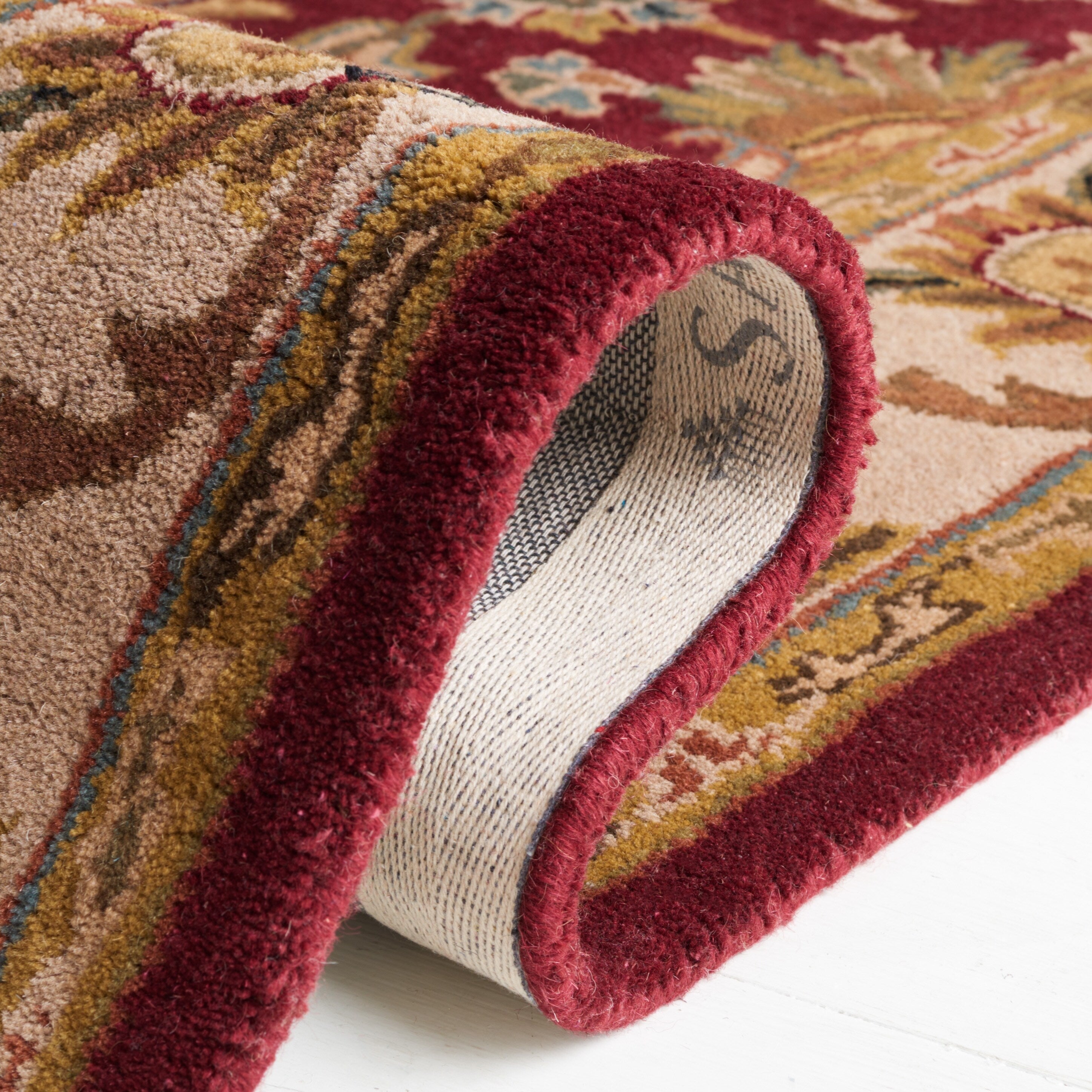 SAFAVIEH Handmade Heritage Lion Traditional Oriental Wool Rug