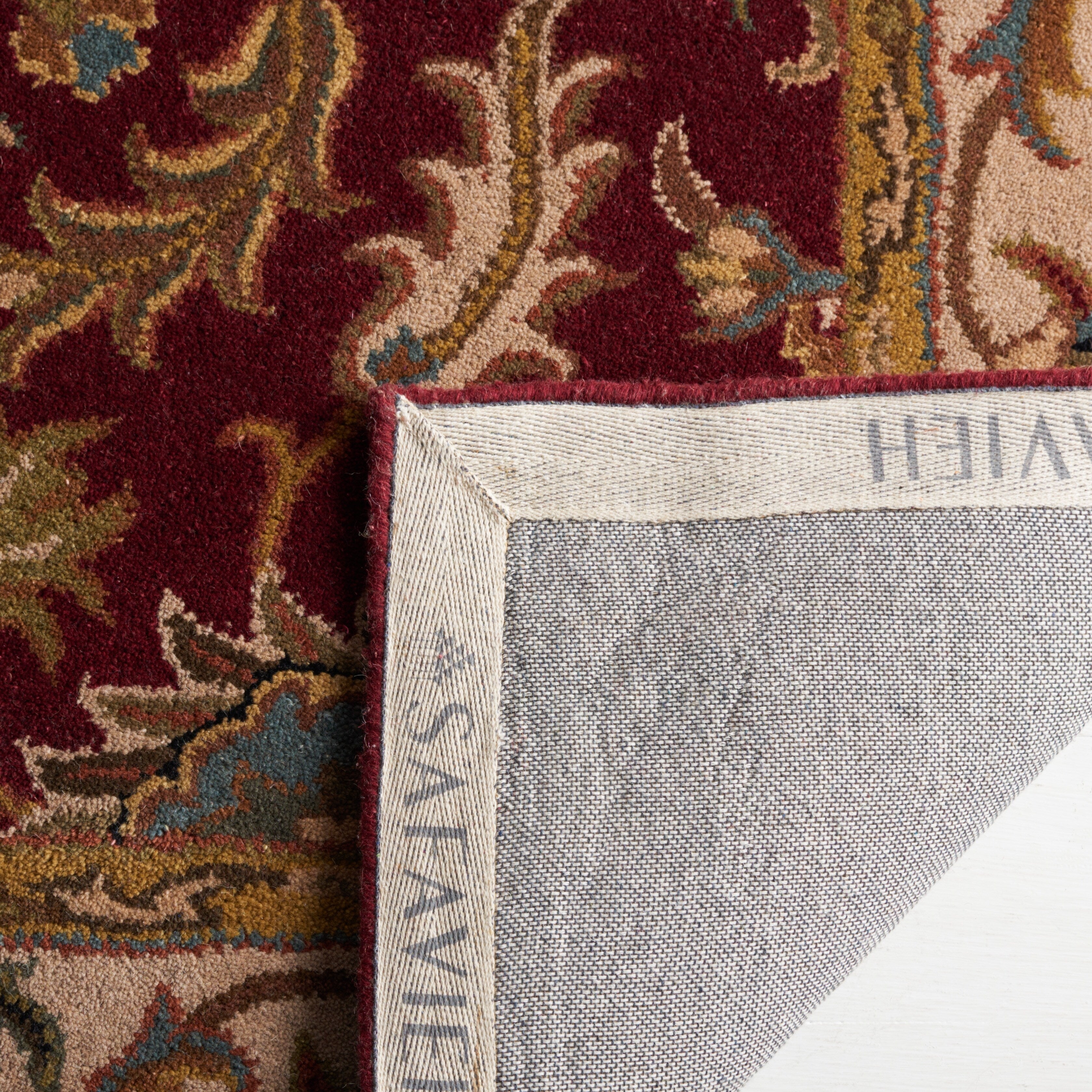 SAFAVIEH Handmade Heritage Lion Traditional Oriental Wool Rug