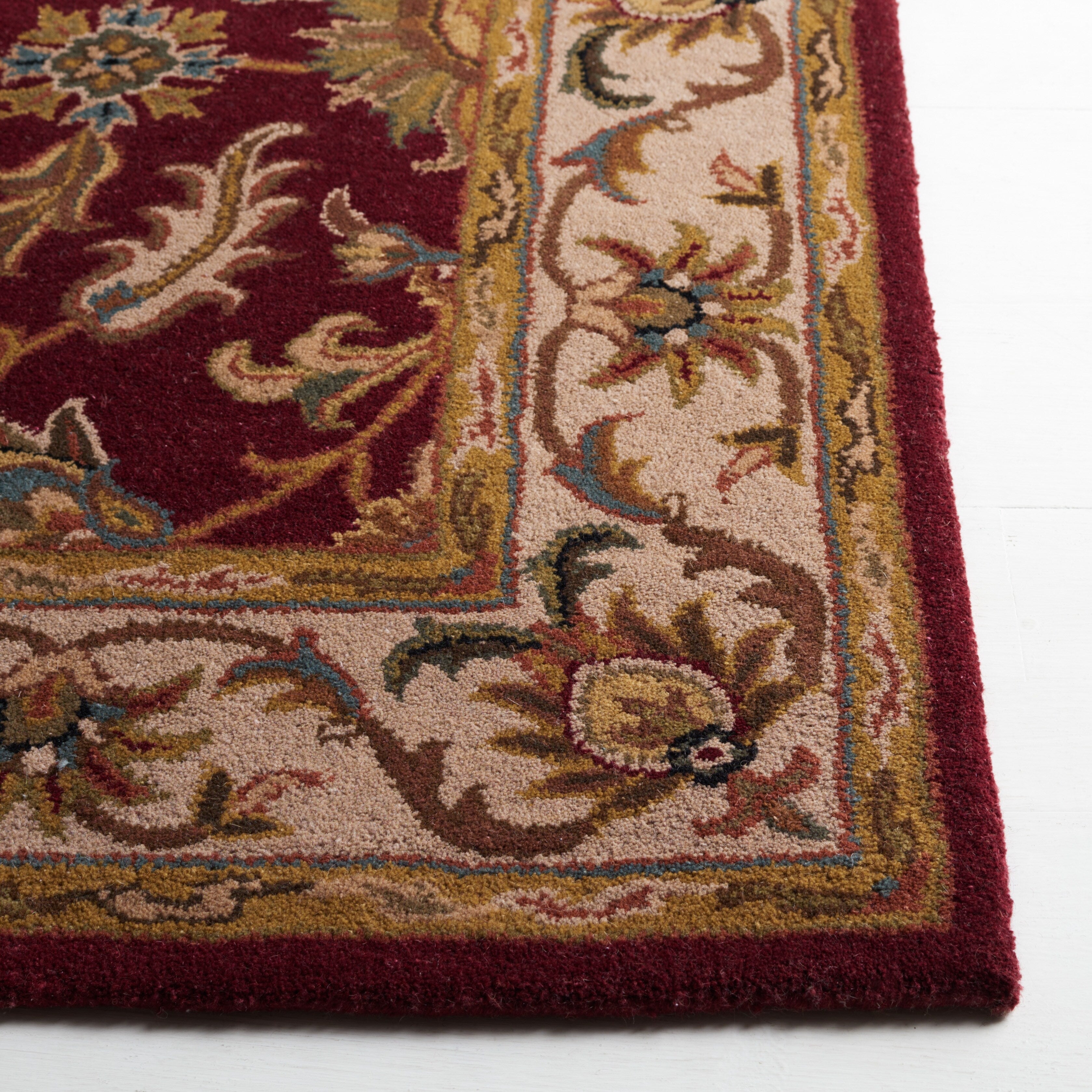 SAFAVIEH Handmade Heritage Lion Traditional Oriental Wool Rug