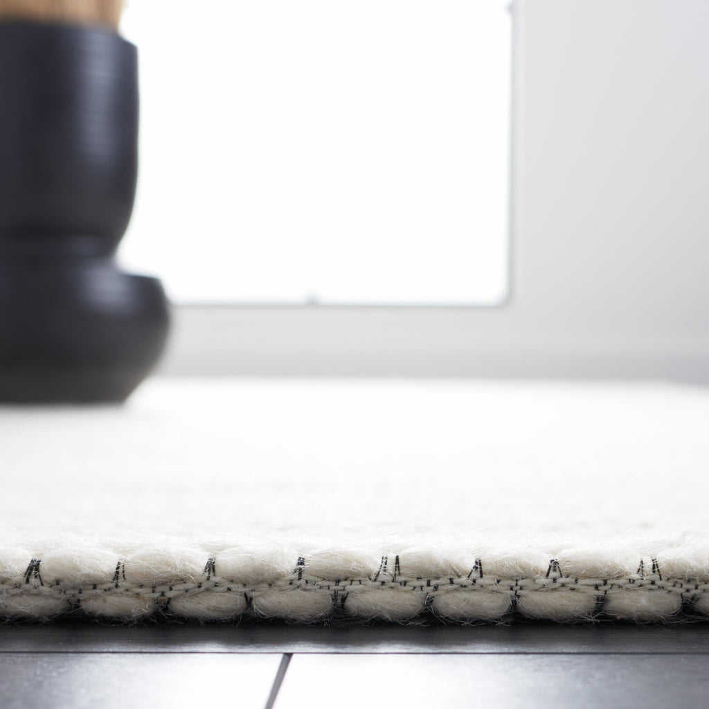 SAFAVIEH Handmade Natura Gerrita Wool Area Rug