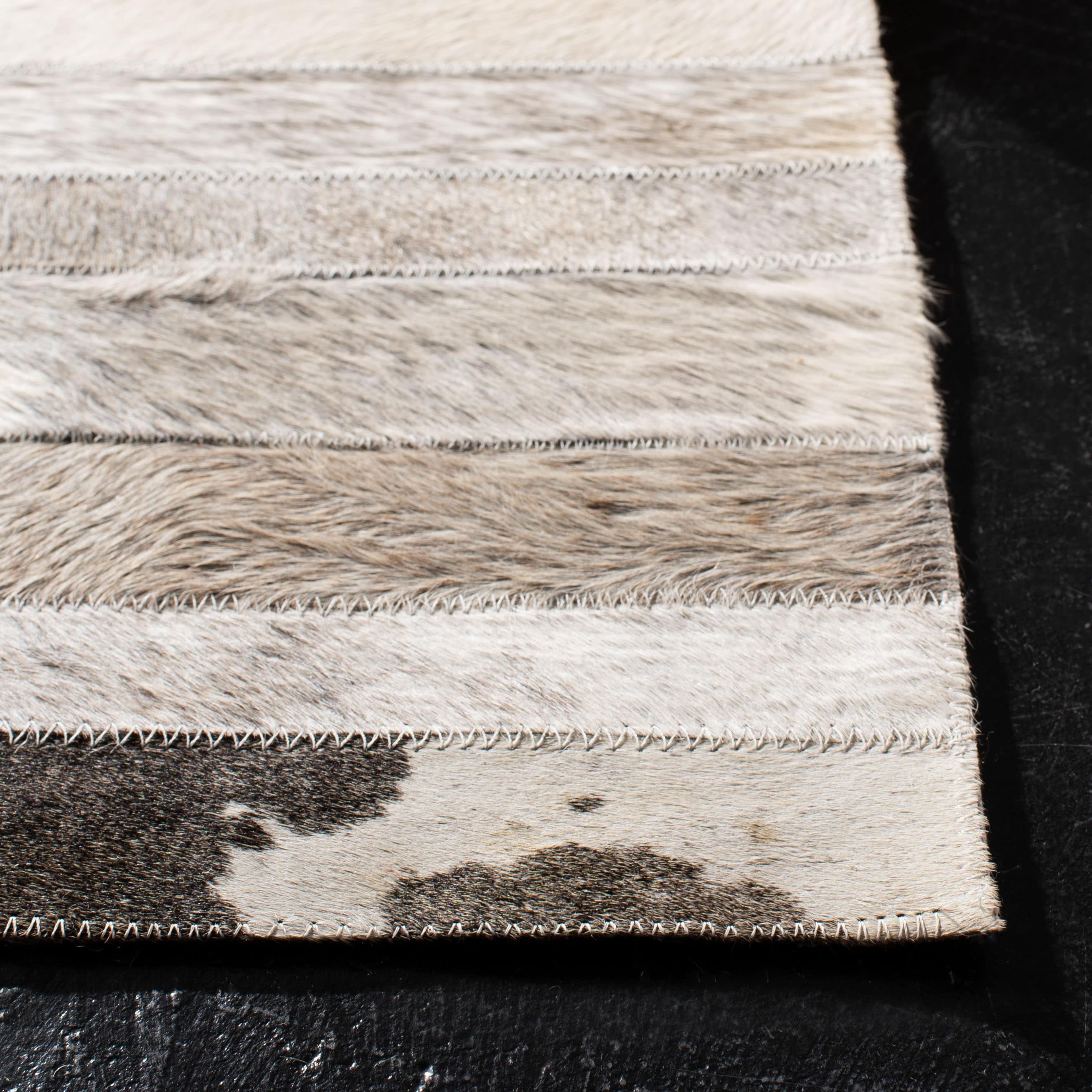 SAFAVIEH Handmade Studio Leather Tennille Modern Leather Rug