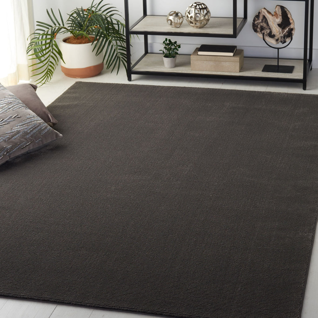 SAFAVIEH Revive Avie Solid Rug
