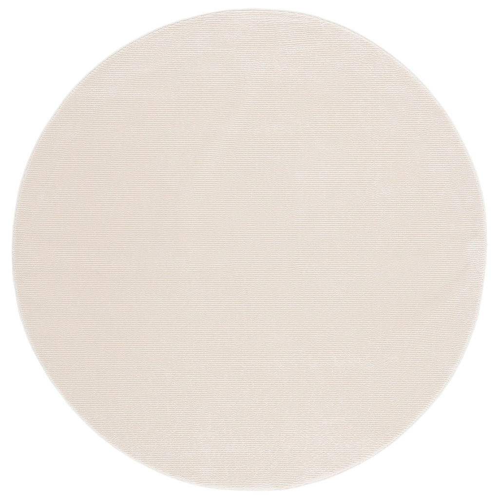 SAFAVIEH Revive Avie Solid Rug