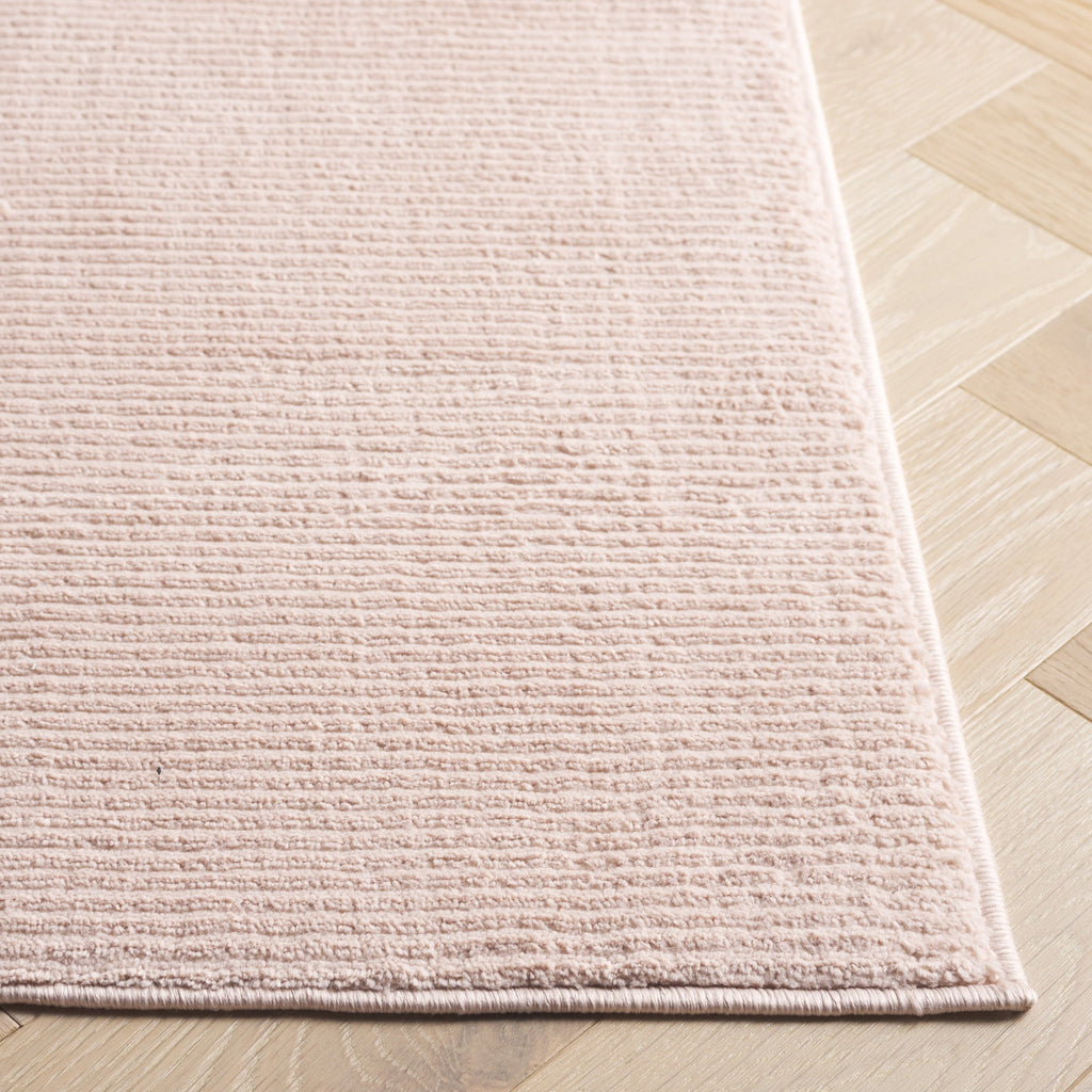 SAFAVIEH Revive Avie Solid Rug