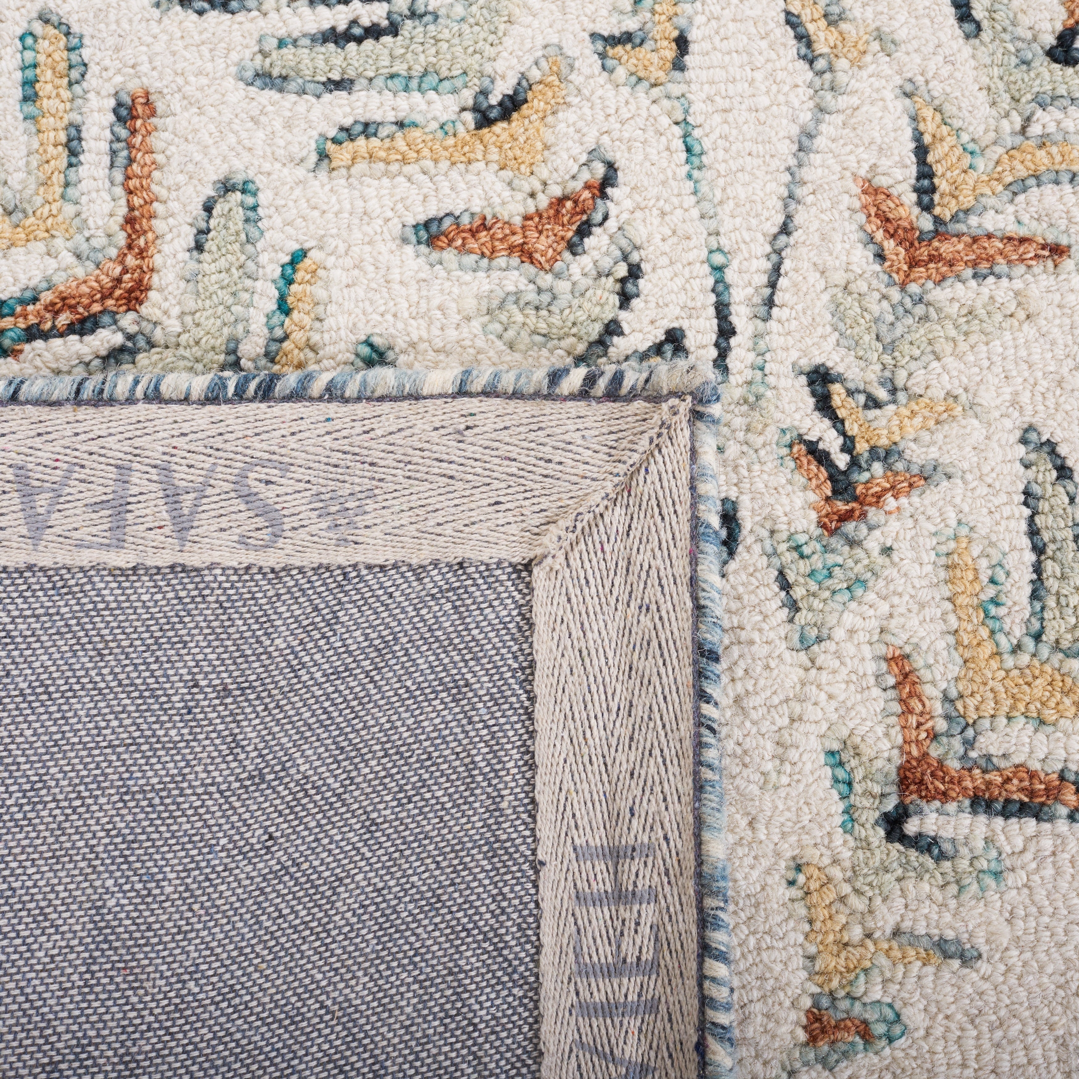 SAFAVIEH Handmade Capri Kert Wool Rug